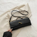 Croc-Embossed Twist-Lock Clutch