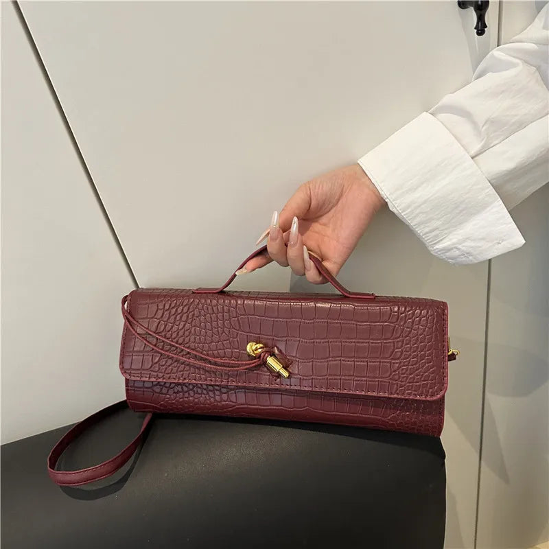 Croc-Embossed Twist-Lock Clutch