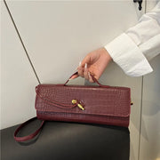 Croc-Embossed Twist-Lock Clutch