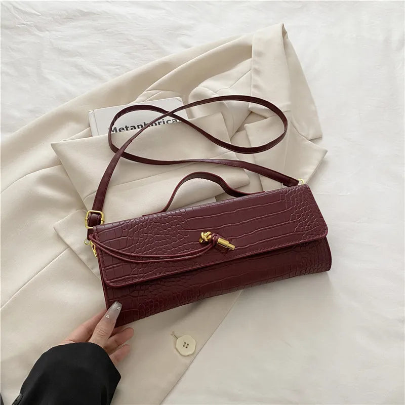 Croc-Embossed Twist-Lock Clutch