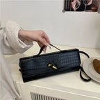 Croc-Embossed Twist-Lock Clutch