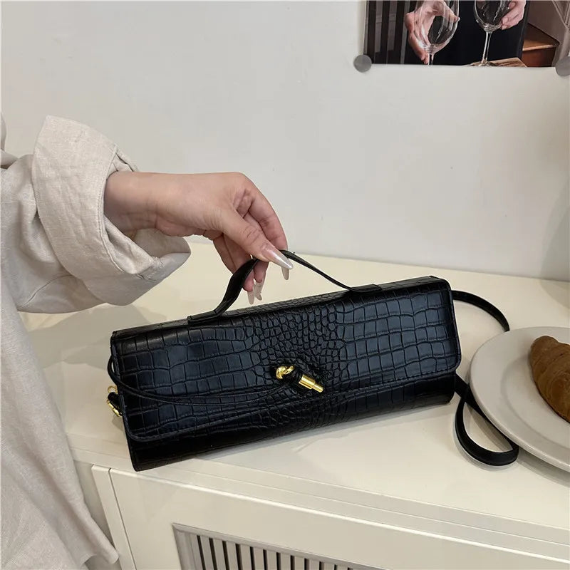 Croc-Embossed Twist-Lock Clutch