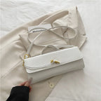 Croc-Embossed Twist-Lock Clutch
