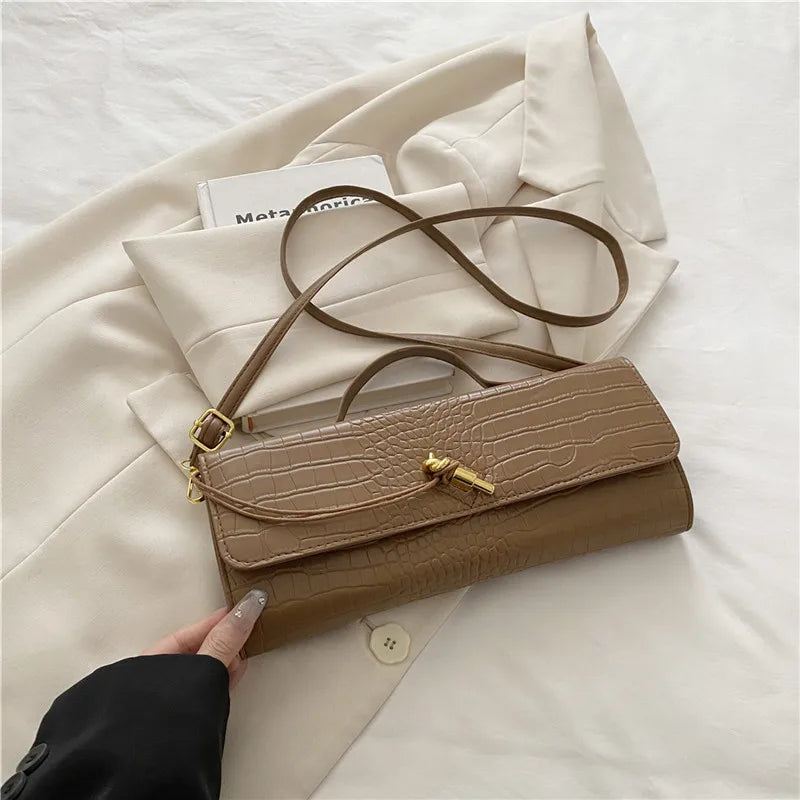 Croc-Embossed Twist-Lock Clutch